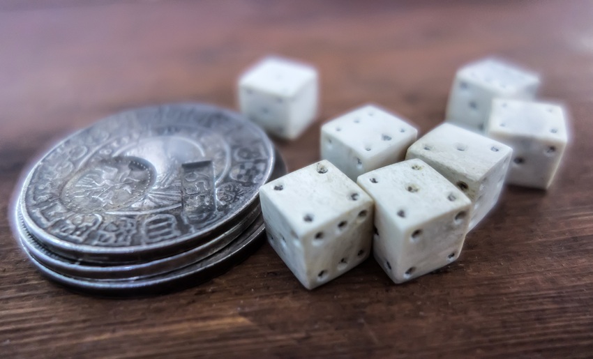 old dice and coins