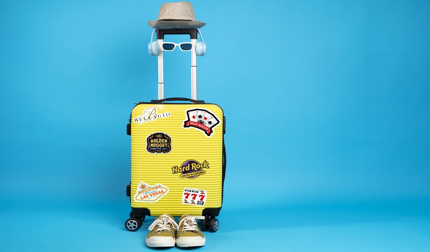 suitcase with casino stickers