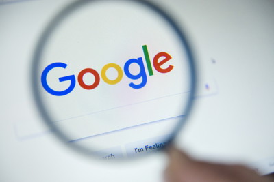 google webpage under magnifying glass